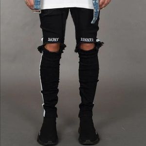 BLACK DISTRESSED DENIM JEANS W/ EMBROIDERY....